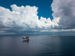 Aerial view from a drone of an offshore jack up rig at the offshore location during day time