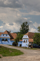 houses painted in blue in Roadeș, Brașov Romania 2019