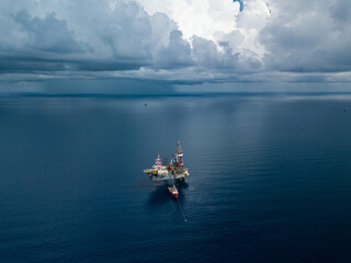 Aerial view from a drone of an offshore jack up rig at the offshore location during day time
