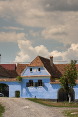 houses painted in blue in Roadeș, Brașov, Romania 2019