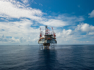 Aerial view from a drone of an offshore jack up rig at the offshore location during day time