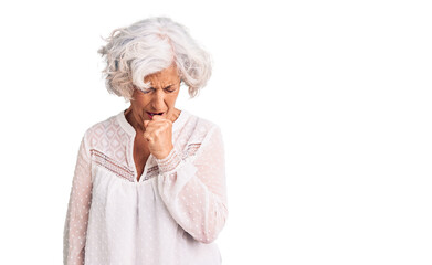 Senior grey-haired woman wearing casual clothes feeling unwell and coughing as symptom for cold or bronchitis. health care concept.