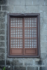 Old wood and shells window of the house