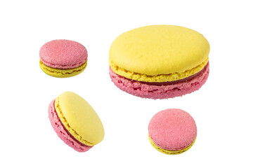 Tasty pink and yellow macaroons isolated on white background. Double-sided macaroons.