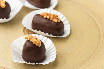 chocolate cameo decorated with walnuts