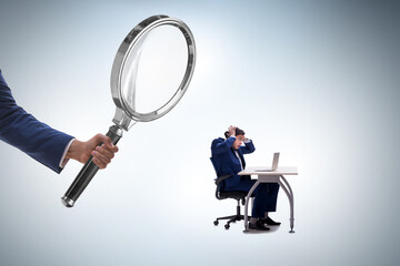 Concept of employee monitoring by boss