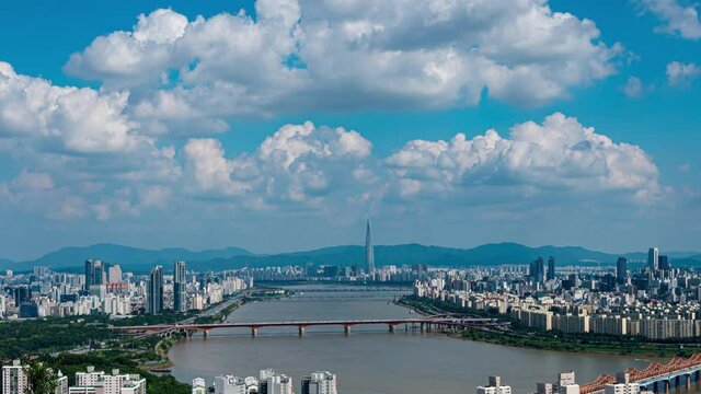 time lapse 4k.Seoul city South Korea. Han River and bridge from maebong  mountain at summer (zoom in)