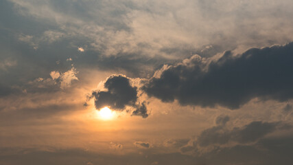 Evening orange sunset warm glowing light. Smokey sky from forest fires. Heavenly divine light and...