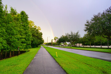 Naklejka premium Beautiful double rainbow in summer