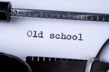 Old school written with a vintage typewriter