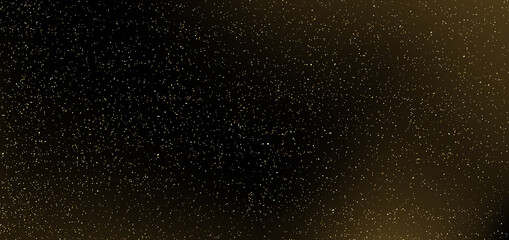 Fototapeta na wymiar Gold glitter on black background. Many golden dots particles in darkness.