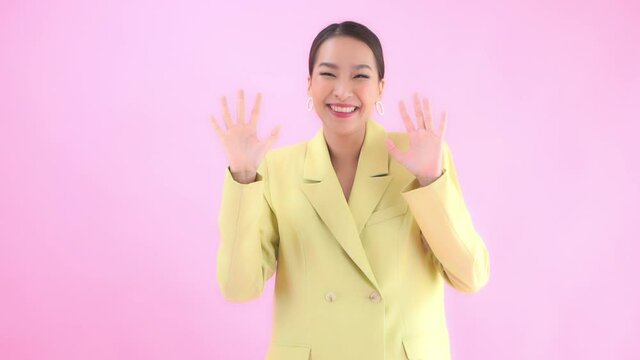 Asian american woman pretending to smile /pose