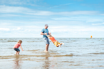 Father and children spending time.