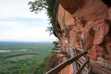 Beautiful mountain landscape with red stone cliff of Phu Thok the famous tourist attraction of Bueng Kan
