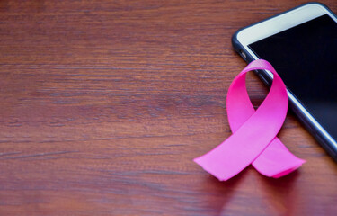 Pink ribbon, symbol of supporting the breast cancer campaign around the world.