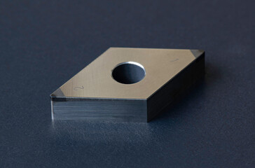 insert positive rhombic cutting tool with hole. Coated, cermet for steel stainless cast iron....
