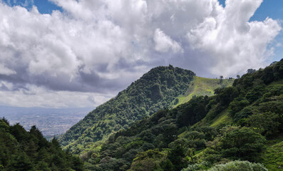 Fototapeta na wymiar Aerial view of the Cruz de Alajuelita and Pico Blanco in Escazu, Costa Rica