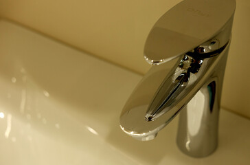 Modern bathroom faucet close up