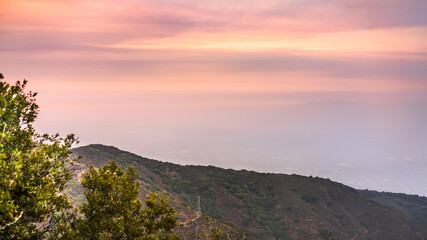 Sunset views in Santa Cruz mountains; Smoke from the nearby burning wildfires, covering the entire...
