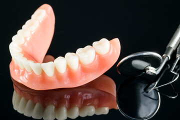 Teeth model showing an implant crown bridge model/ dental demonstration teeth study teach model.