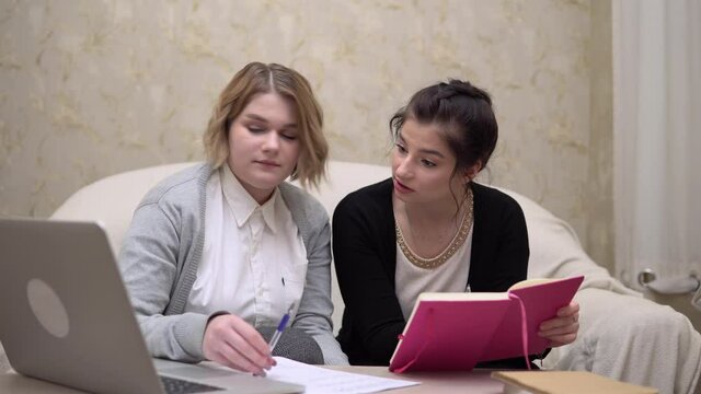 Woman studens working at home, online home education, distance working,