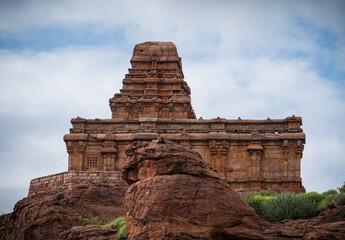 Fototapeta na wymiar Ancient Hindu temple built by Badami chalukyas in red sandstone rock, having ancient indian architecture.