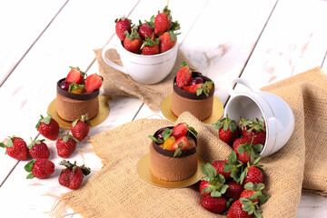 Background fresh dessert with chocolate cake and strawberry