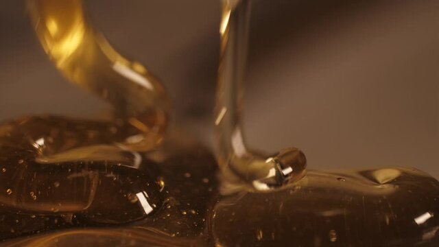 pouring honey on honey slow motion 4k