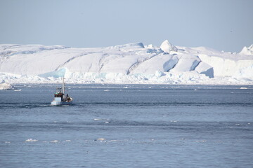 Ship sailing on Disko Bay, Ilulissat, Greenland.
