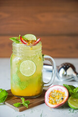 One glass of passion fruit on marble table