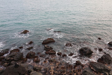Fototapeta na wymiar 바다의 작은 돌들, Small stones in the sea