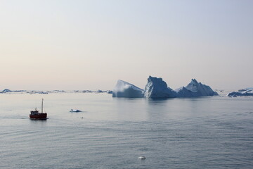 Ship sailing on Disko Bay, Ilulissat, Greenland.