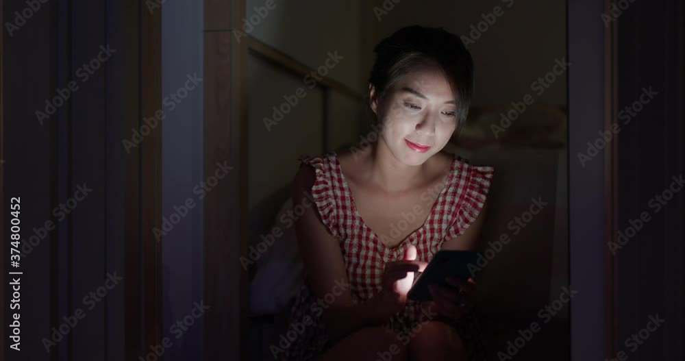 Canvas Prints Woman work on mobile phone at living room