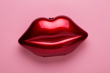 Elegant fashion accessory, woman clutch shaped as red lips