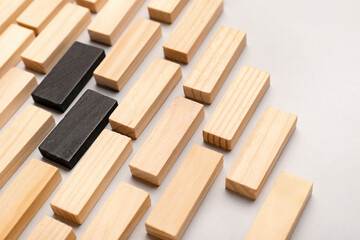 Different blocks on grey background. Racism concept