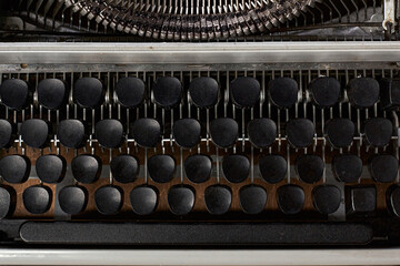 Closeup, blank old fashioned typewriter buttons.