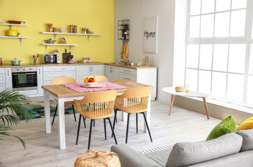 Interior of stylish modern kitchen with dining table