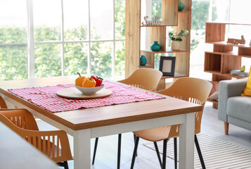 Dining table in interior of modern room
