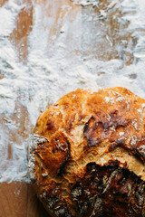 freshly baked bread on wooden background with copy space