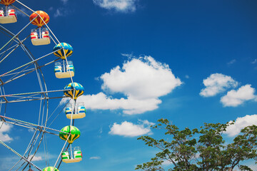 Ferris Wheel with Blue Sky and clouds