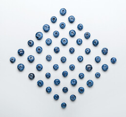 Tasty blueberry on light background