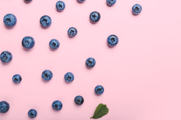 Tasty blueberry on color background
