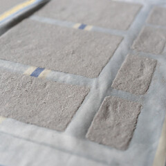 Handmade paper making process. The sheets of paper dry on the cloth.