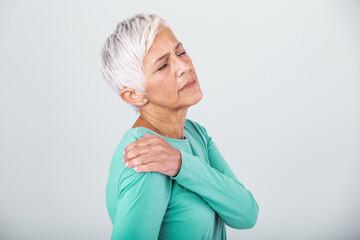 Senior woman with shoulder pain. Elderly woman is enduring awful ache. Shoulder Pain In An Elderly...