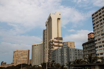 Fototapeta na wymiar Hotels Against Cloudy Skyline on Durban's Golden Mile