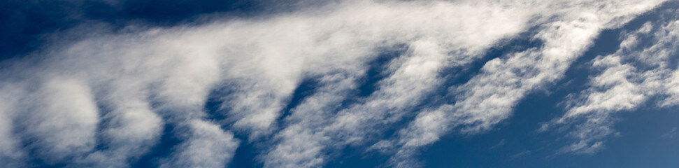 High white wispy cirrus clouds with cirro-stratus in the blue Australian sky  in late winter...