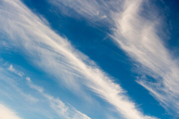 High white wispy cirrus clouds with cirro-stratus in the blue Australian sky  in late winter...