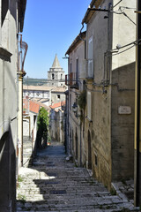 A narrow street among the old houses of Riccia, a medieval village in the Molise region.