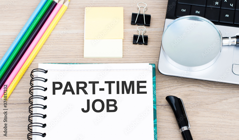 Poster text part time job on a notebook that is on the desktop