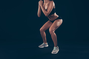 Cropped side photo short sport suit lady body weight workout sit ups improving ass muscles isolated...